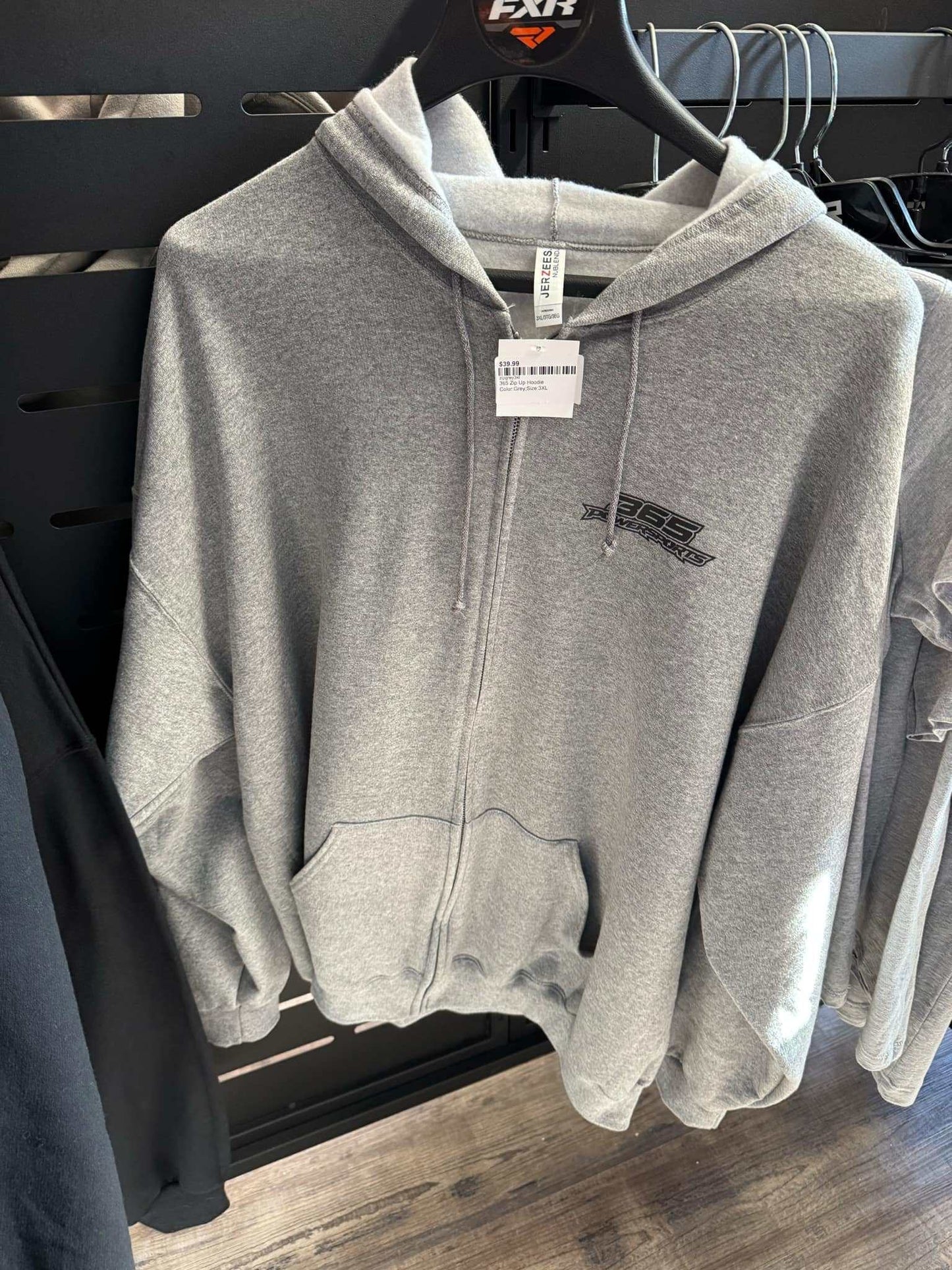 Gray 365 Zip Up Hoodie on hanger.