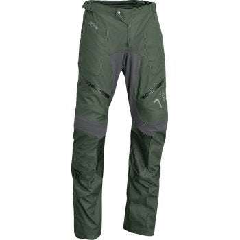 THOR Terrain Over-the-Boot Pants in green with rip-stop panels, waterproof zippers, leather knee panels, and adjustable waist cinches.