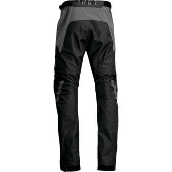 THOR Terrain Over-the-Boot PantsFeatures

Internal hip pocket
Rip-stop, abrasion resistant paneling in high-wear areas
Durable stitching throughout
Two high-volume pockets with waterproof zippers
FMoto Pants