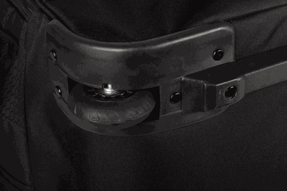 Wheel detail of the KLIM Team Gear Bag with rugged construction and easy transport design.