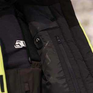 Close-up of the 509 Temper Insulated Coat showcasing interior insulation and YKK zippers.