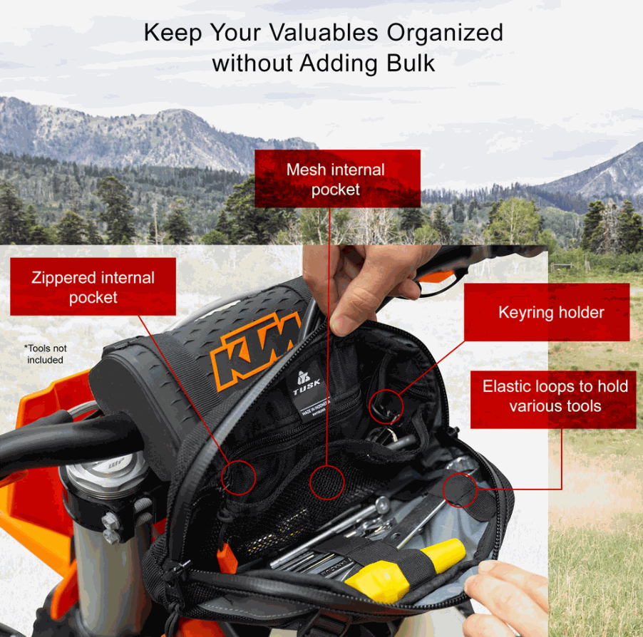 Tusk Handlebar Bag on motorcycle with labeled internal zippered pocket, mesh pocket, keyring holder, and elastic tool loops against mountain background