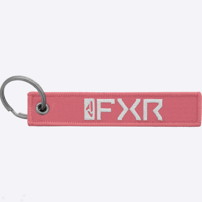 FXR Flight Tag 24 keychain in pink with a metal ring.