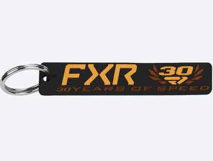 FXR Flight Tag key chain with 30 years of speed design